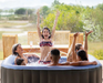 Family of 6 enjoying MSPA Tekapo inflatable bubble spa