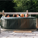 Family of 5 enjoying the Meteor Inflatable Hot Tub by MSPA