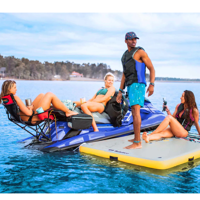 People enjoying Solstice 6x5 inflatable dock on lake