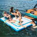 Sunbathers hanging out of Solstice Inflatable dock with insert  on lake