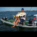 Angler shows off his big fish on his Sea Eagle 12'6" Fishing Rig Package Inflatable SUP
