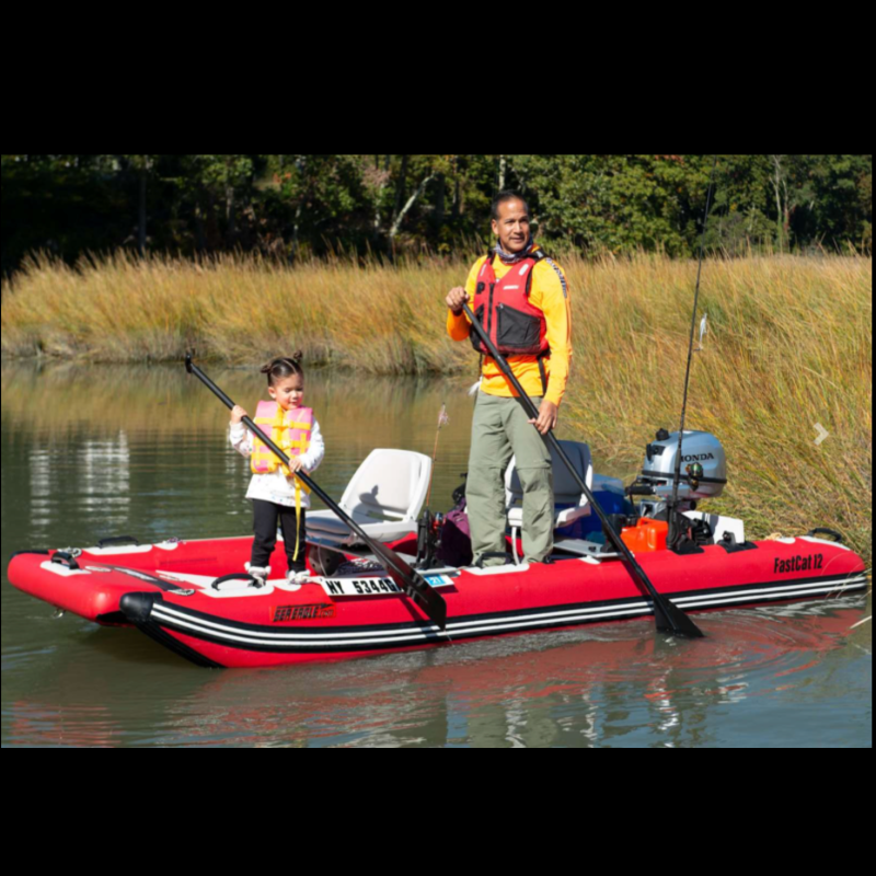 Father and Daughter on Sea Eagle FastCat 12' Deluxe Package  Catamaran Inflatable Boat